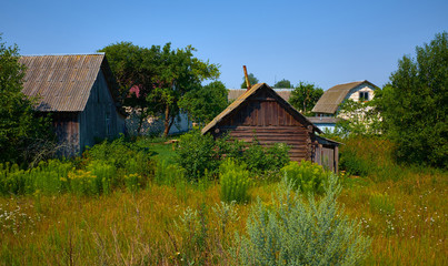 Belarus, Russian old wooden village houses at sunny day