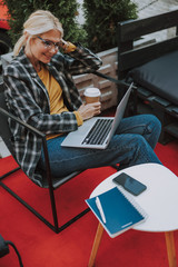 Fototapeta na wymiar Businesswoman sitting in front of her laptop