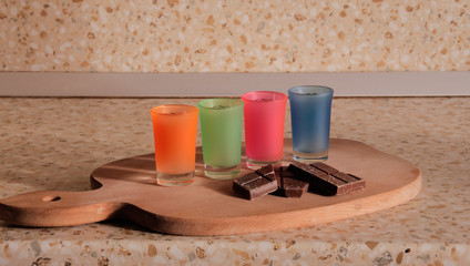 A shot of gin and black chocolate