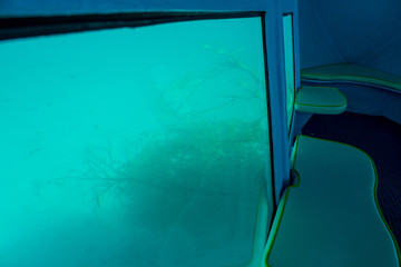 Interior view of a glass bottom boat navigating through the Adriatic sea off the coast of Krk Island, Croatia