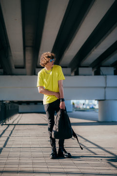 Young man going for walk in centre stock photo