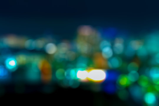 Abstract blurred night cityscape bokeh lights background in Japan © Tierney