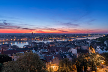 Fototapeta na wymiar View from the castle hill, across the Danube with the Chain Bridge at sunrise.