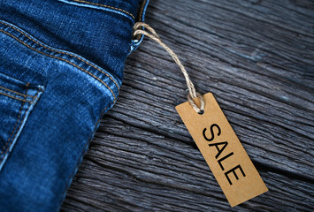 tag for sale promotion on jeans with space for your text.