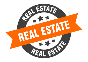 Fototapeta premium real estate sign. real estate orange-black round ribbon sticker