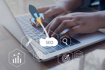 SEO Search Engine Optimization concept with laptop computer. ranking traffic on website, internet...