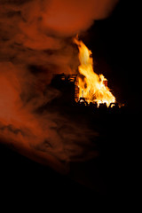 Fire and smoke form a burning building on bonfire night