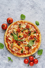 Close up of healthy vegetarian pizza with cheese and vegetables