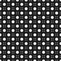 Modern four dot and big dot seamless pattern isolated on black background