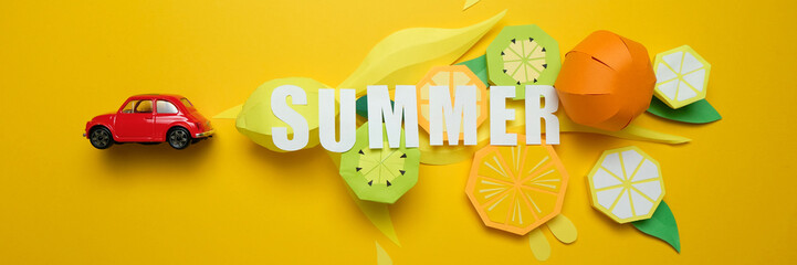 letter summer cut from paper with tropical fruit paper