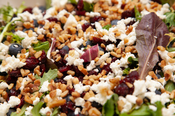 Spinach salad with cheese and fruit
