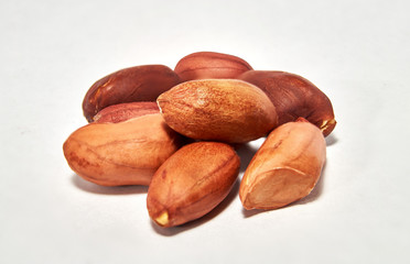 Dried roasted peanuts in closeup. Organic vegan food