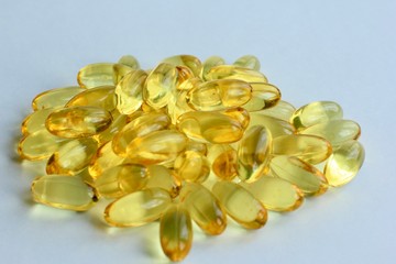 antioxidant, background, capsule, capsules, care, close-up, cod, cod liver, colour, concept, conceptual, fish, fish oil, fish-oil, golden, health, health care, healthy, healthy lifestyle, heart, illne