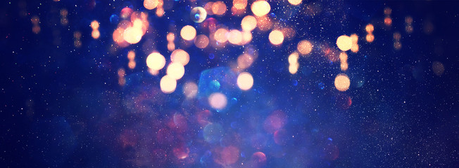 abstract glitter silver, gold , blue lights background. de-focused. banner