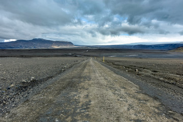 Dusty road through the beautiful icelandic highlands to Langjokull Glacier, Vesturland, Iceland