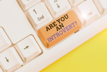 Text sign showing Are You An Introvertquestion. Business photo text demonstrating who tends to turn...