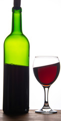 bottle and glass of red wine