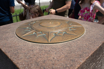 Washington, DC - Zero Milestone - point for the measurement of distance from Washington on highways of the USA marker, in front of the White House. Crowds gather