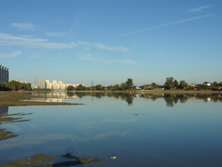 high-rise new buildings on the western edge of the city of Krasnodar (southern Russia) by the river...