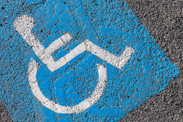 Close - up of disabled parking sign