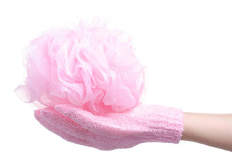 Pink loofah bath sponge in hand on white background isolation