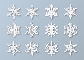 Paper snowflakes. New year and christmas papercut 3d snowflake elements. White winter snow ornament decoration, origami vector set