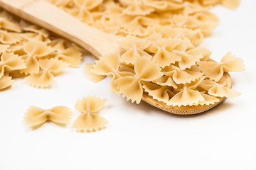 Pasta farfalle on white background