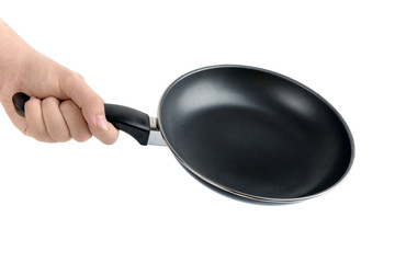 Female hand holding frying pan isolated