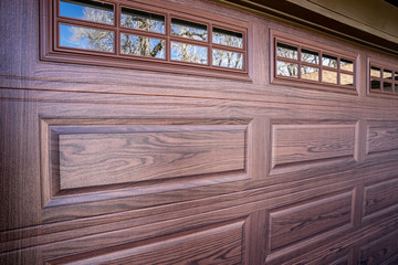 Custom wood looking garage door with windows