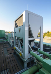 Ventilation system outside. Blue sky. Sunny day.
