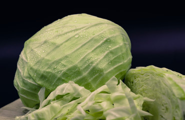 Green cabbage, isolated on a black background