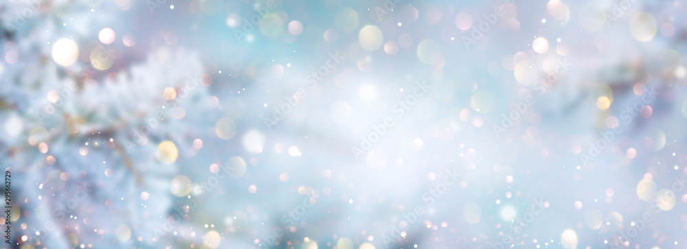Wall mural christmas winter blurred background. xmas tree with snow decorated with garland lights, holiday fest