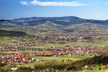 Fototapeta na wymiar Village Barcice and Town Stary Sacz are located in bottom of the valley called Kotlina Sadecka. Beskid Sadecki Mountains in Spring, Poland.