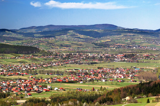 Village Barcice and Town Stary Sacz are located in bottom of the valley called Kotlina Sadecka. Beskid Sadecki Mountains in Spring, Poland.
