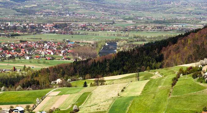 Village Barcice and Town Stary Sacz are located in bottom of the valley called Kotlina Sadecka, between two rivers - Dunajec and Poprad. Beskid Sadecki Mountains in Spring, Poland.