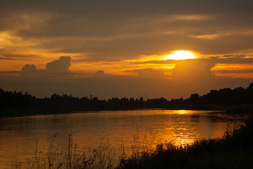 Summer sunset over a quiet river