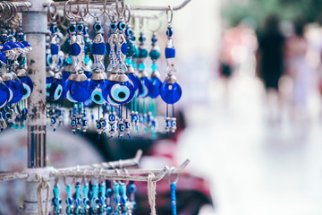 Evil eye bead protection amulet in the shop or market. One of the most popular souvenirs from Istanbul, Turkey 2019-08-18