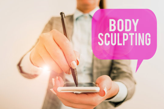 Word writing text Body Sculpting. Business photo showcasing activity of increasing the body s is visible muscle tone Business woman pointing in empty space with pen