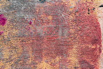 Texture of a concrete wall with cracks and scratches which can be used as a background