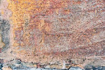 Texture of a concrete wall with cracks and scratches which can be used as a background