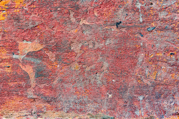 Texture of a concrete wall with cracks and scratches which can be used as a background