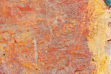Texture of a concrete wall with cracks and scratches which can be used as a background