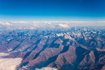 Obraz premium view from the aircraft to the mountains of the Himalaya on Chinese Tibetan side