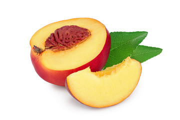 Half nectarine fruit with leaf isolated on white background cutout