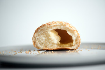 bakery products with sesame and cheddar cheese