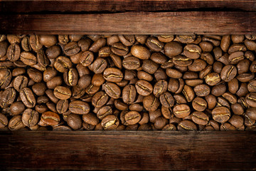 texture of coffee on a background of dark wood