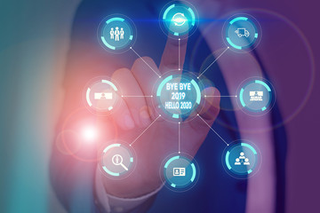 Writing note showing Bye Bye 2019 Hello 2020. Business concept for saying goodbye to last year and welcoming another good one Picture photo system network scheme modern smart device