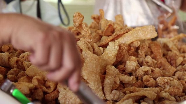 Crispy Pork Skin, Pork rinds also known as chicharon or chicharrones , deep fried pork skin , kab moo 