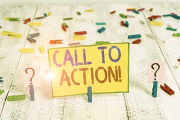 Text sign showing Call To Action. Business photo text exhortation do something in order achieve aim with problem Scribbled and crumbling sheet with paper clips placed on the wooden table