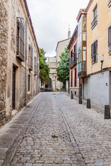 Narrow street in the old town of Avila, Spain.